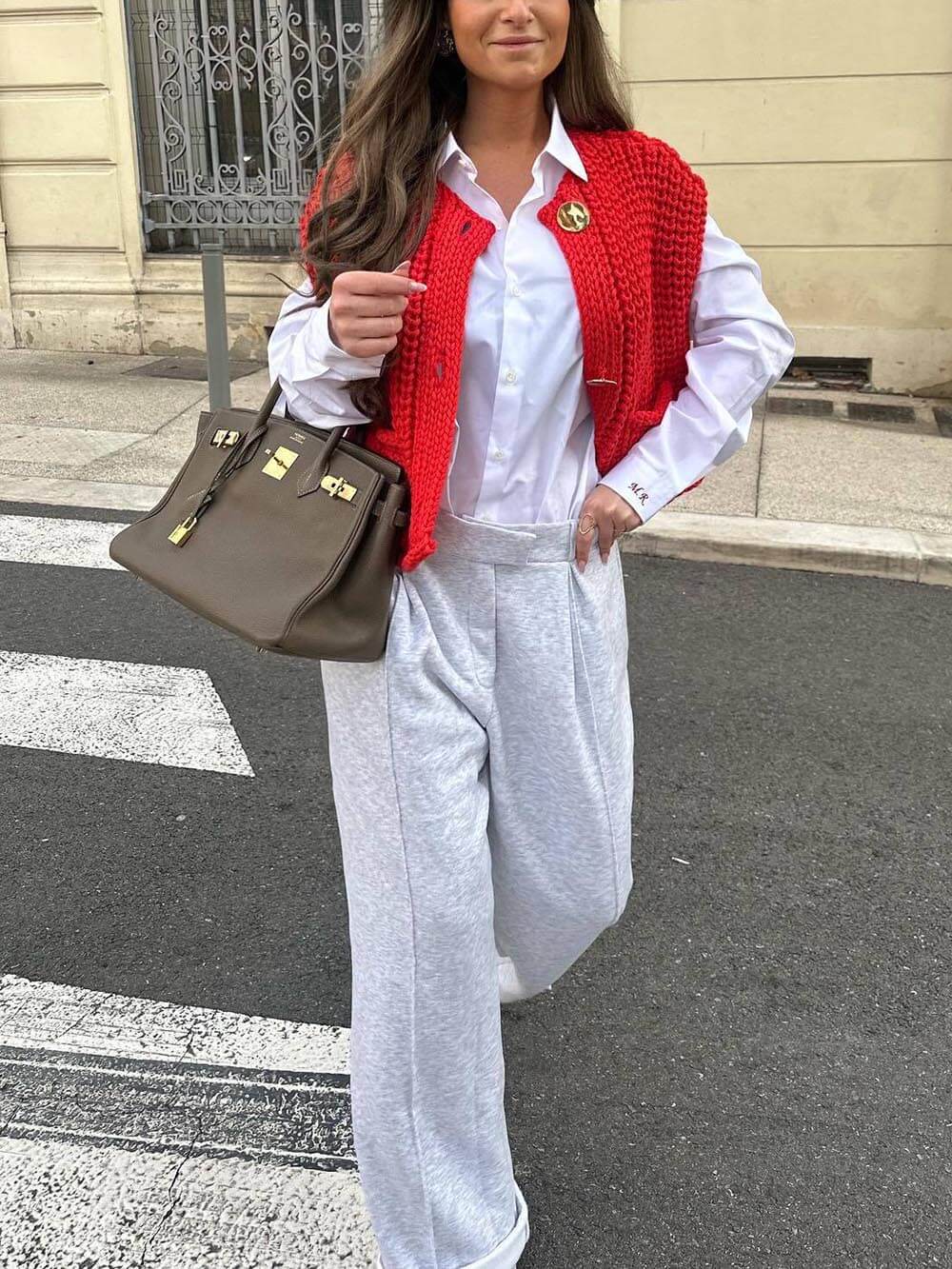 Élégant cardigan court sans manches à poche